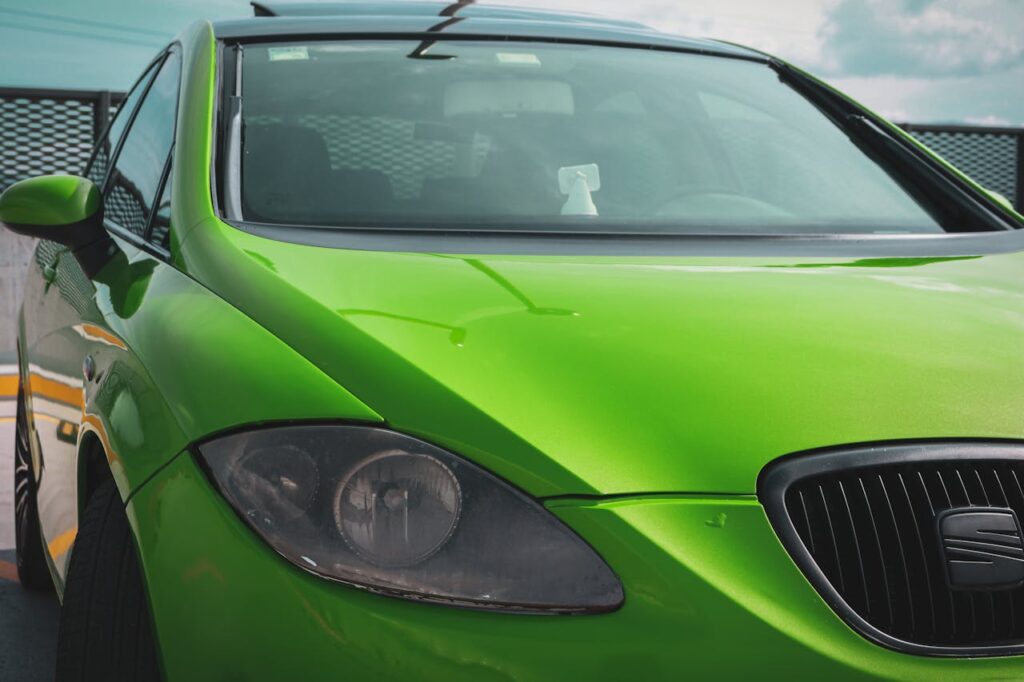 A green car with a green hood and green paint